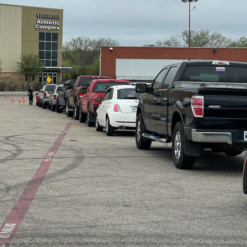  Cars lined up for food distribution event